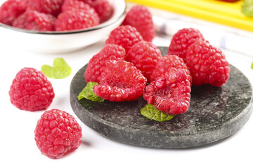 Fresh Red Raspberries on Slate Plate with Mint Leaves - Healthy Organic Berry Fruit