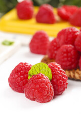 Fresh Red Raspberries with Green Leaf - Healthy Organic Berry Fruit Close-up
