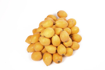 Fresh Yunnan Loquat Fruits Pile on White Background - Asian Tropical Fruit