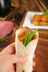 Chinese Pancake Wrap with BBQ Meat Skewers and Green Onions Traditional Street Food