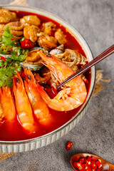 Spicy Seafood Hot Pot with Fresh Prawns Octopus and Fish in Red Broth Asian Cuisine