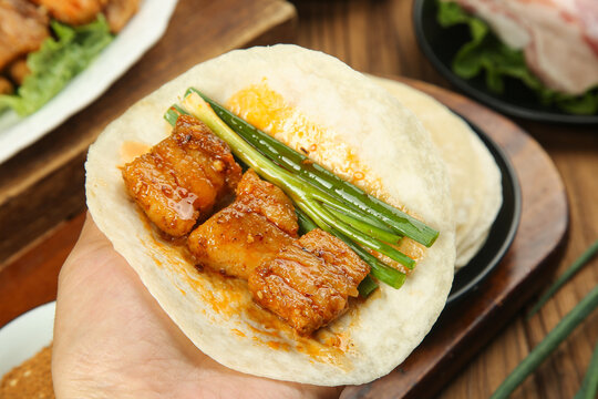 Chinese BBQ Meat Skewers with Green Onions in Flatbread - Traditional Asian Street Food