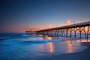 Obraz premium Wilmington North Carolina. Sunrise at Johnnie Mercers Fishing Pier in Wrightsville Beach