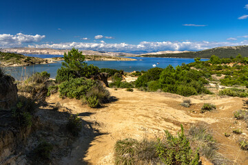 Fototapeta premium Sand dunes, rock formations, and a trail leading to the FKK Ciganka naturist beach on the island of Rab