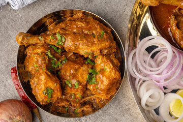 Chicken Kohlapuri is spicy Maharashtrian delicary of tender boneless chicken cooked with aromatic roasted ground spices and coconut. India food.