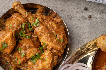 Chicken Kohlapuri is spicy Maharashtrian delicary of tender boneless chicken cooked with aromatic roasted ground spices and coconut. India food.