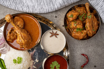 Chicken Kohlapuri is spicy Maharashtrian delicary of tender boneless chicken cooked with aromatic roasted ground spices and coconut. India food.
