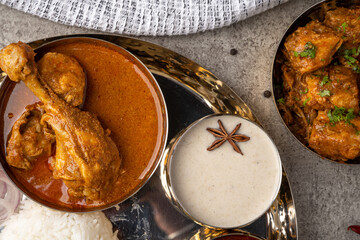 Chicken Kohlapuri is spicy Maharashtrian delicary of tender boneless chicken cooked with aromatic roasted ground spices and coconut. India food.
