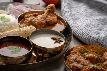 Chicken Kohlapuri is spicy Maharashtrian delicary of tender boneless chicken cooked with aromatic roasted ground spices and coconut. India food.
