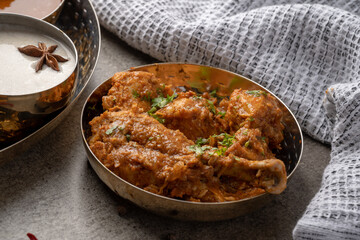 Chicken Kohlapuri is spicy Maharashtrian delicary of tender boneless chicken cooked with aromatic roasted ground spices and coconut. India food.