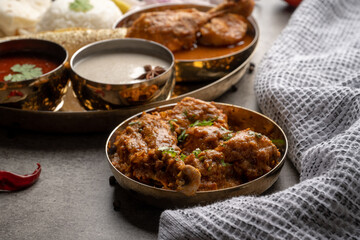 Chicken Kohlapuri is spicy Maharashtrian delicary of tender boneless chicken cooked with aromatic roasted ground spices and coconut. India food.