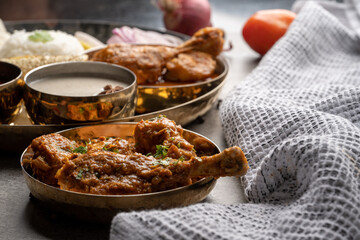 Chicken Kohlapuri is spicy Maharashtrian delicary of tender boneless chicken cooked with aromatic roasted ground spices and coconut. India food.