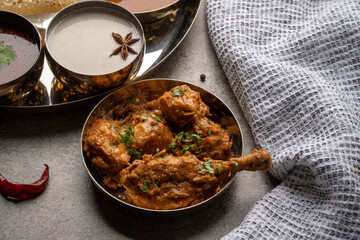 Chicken Kohlapuri is spicy Maharashtrian delicary of tender boneless chicken cooked with aromatic roasted ground spices and coconut. India food.