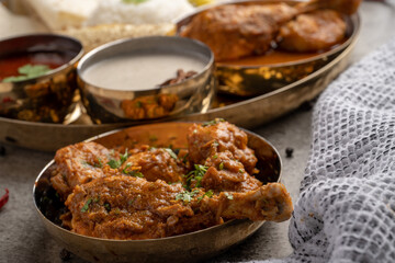 Chicken Kohlapuri is spicy Maharashtrian delicary of tender boneless chicken cooked with aromatic roasted ground spices and coconut. India food.