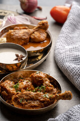 Chicken Kohlapuri is spicy Maharashtrian delicary of tender boneless chicken cooked with aromatic roasted ground spices and coconut. India food.