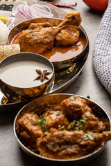 Chicken Kohlapuri is spicy Maharashtrian delicary of tender boneless chicken cooked with aromatic roasted ground spices and coconut. India food.