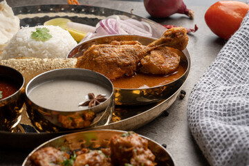 Chicken Kohlapuri is spicy Maharashtrian delicary of tender boneless chicken cooked with aromatic roasted ground spices and coconut. India food.