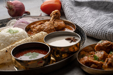 Chicken Kohlapuri is spicy Maharashtrian delicary of tender boneless chicken cooked with aromatic roasted ground spices and coconut. India food.