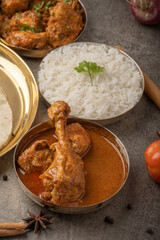 Kolhapuri chicken Thali is a popular Indian asian food platter consists of poultry meat, chikan...
