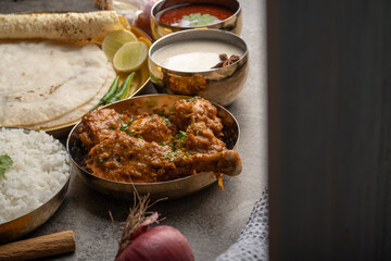 Chicken Kohlapuri is spicy Maharashtrian delicary of tender boneless chicken cooked with aromatic roasted ground spices and coconut. India food.