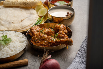 Chicken Kohlapuri is spicy Maharashtrian delicary of tender boneless chicken cooked with aromatic roasted ground spices and coconut. India food.