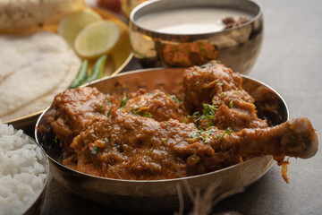 Chicken Kohlapuri is spicy Maharashtrian delicary of tender boneless chicken cooked with aromatic roasted ground spices and coconut. India food.