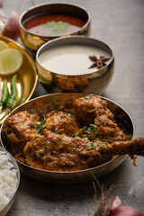 Soop tambda pandhra rassa with bowl