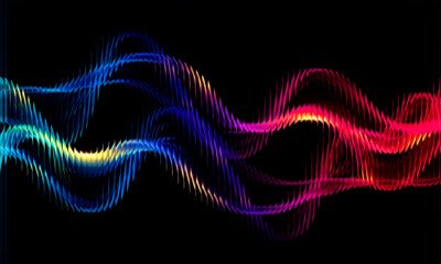 Abstract wavy lines in a spectrum of colors on a black background