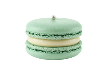 Isolated pistachio macaroon with cream and shiny candy decoration deliciousness sweet treat