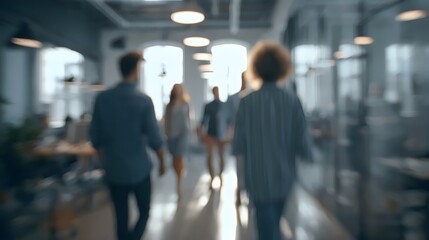 A group of professionals walking through a modern office space, creating a collaborative and dynamic atmosphere.