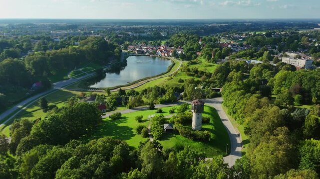 Talsi Town, Green Forest, Saules Kalns, And Lake Martinelli In Summer In Latvia. - aerial shot