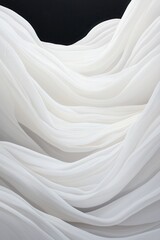 Flowing White Fabric Against Dark Background with Textured Waves