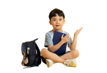 Asian kid A young student with book and backpack is sitting on the floor and pointing with his hand. The boy is sitting cross-legged and smiling happily, ready for learning on PNG