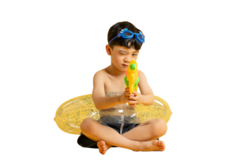 Asian kid A young boy is sitting in an inflatable ring and is holding a water gun, and having fun in summer. PNG