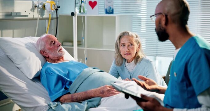 Consulting, patient or senior couple in hospital with doctor, healthcare or cancer treatment. Recovery, support or people in medical care with tablet, advice and planning for surgery in retirement