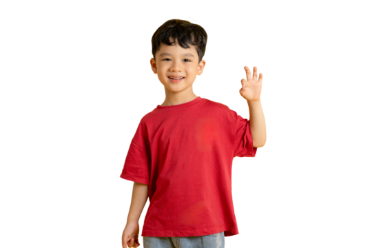 A charming Asian boy in a red shirt smiles and gestures, conveying a sense of joy and friendliness on PNG