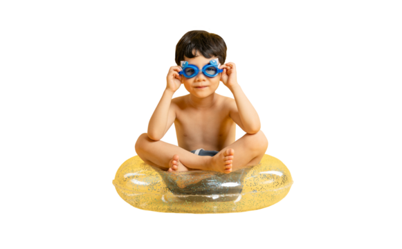 Asian Cute boy wearing funny goggles sitting on a yellow floatie on PNG