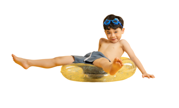 Asian young boy enjoying a relaxing time on a floaty with his swimming goggles on PNG - Powered by Adobe