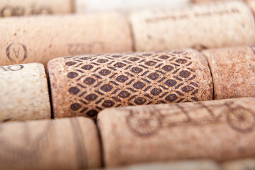A collection of wine corks from around the world. Vintage and wine festival in Tuscany