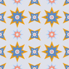 Obraz premium Colorful seamless pattern of abstract ikat flowers in star shapes. Geometric ikat background.