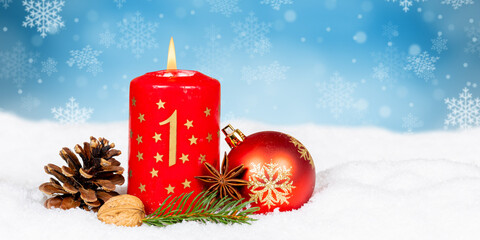 First 1st Sunday in advent with burning candle Christmas card time winter background with copyspace copy space panorama