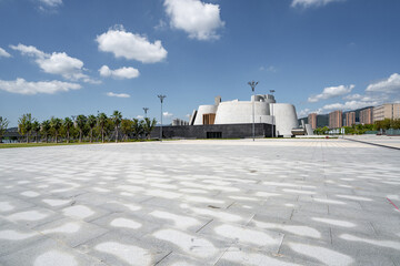 empty brick floor with modern building