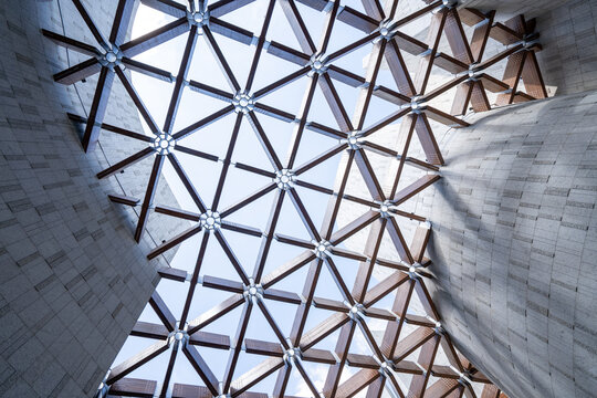 Modern architectural ceiling with geometric metal structure - Powered by Adobe