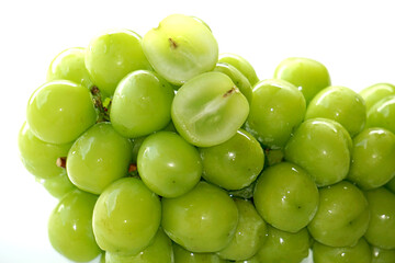 Fresh Bunches of shine muscat grapes green fresh grapes isolated on white background. Japanese grapes ripe juicy grapes.