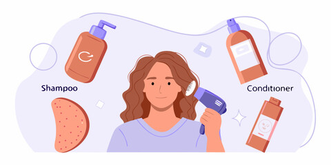 Woman drying her hair with a hairdryer surrounded by shampoo conditioner and hair products