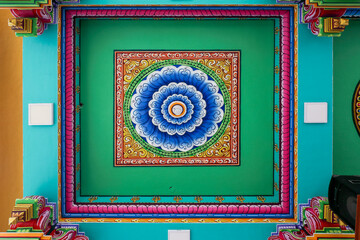 Colorful flower pattern ceiling design in Hindu temple