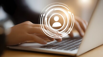 A person typing on a laptop with digital target icons and user silhouettes around, symbolizing online marketing or audience targeting