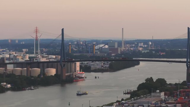 Hamburg K&ouml;hlbrandbr&uuml;cke Sunset with semi trucks and traffic, ships and water