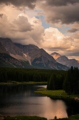 Obraz premium Majestic Mountain Landscape Under a Golden Sky