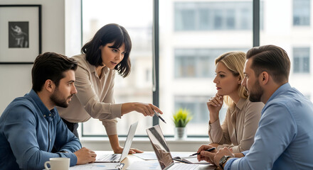 creative professionals analyzing business data together in office meeting using financial charts printed paperwork and computer technology tools work and office life business activity photo